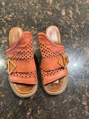 AS98 Perforated Leather Slide Sandals in Rust with Gold Buckle.